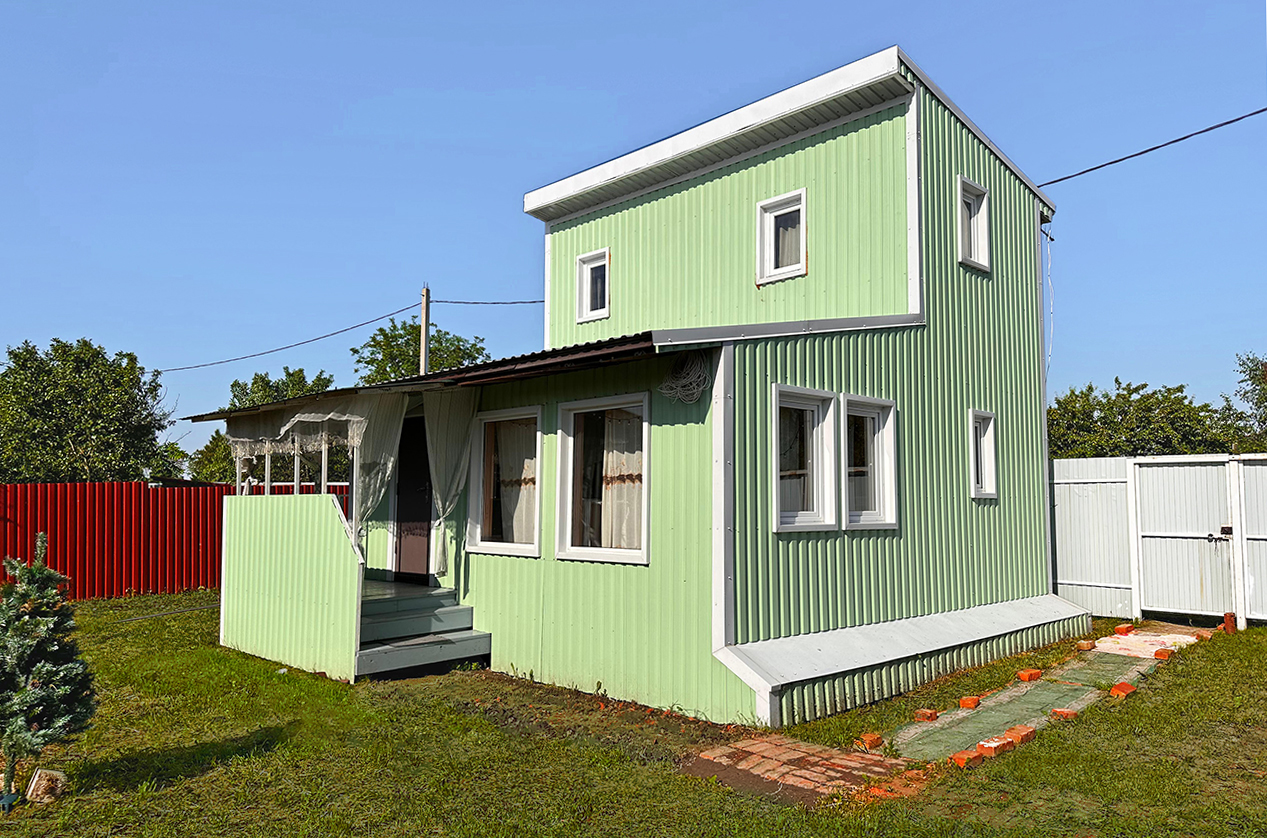 Дом 94,5 м² с гостевым домом 48 м² на участке 7,5 сот.